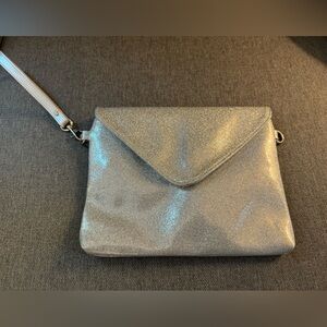 Studio DYI brand new, silver metallic clutch.